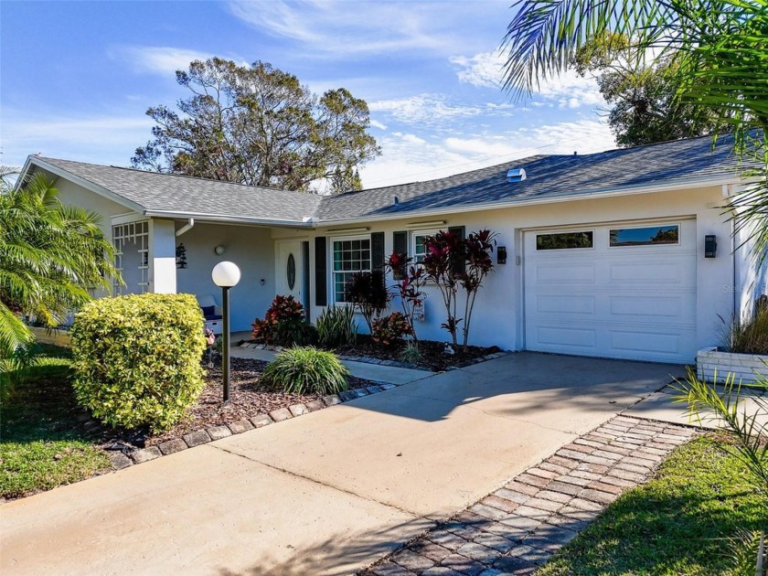 Welcome to a Retreat in Charm at 122 Stafford Dr., Palm Harbor - Beach Home for sale in Palm Harbor, Florida on Beachhouse.com