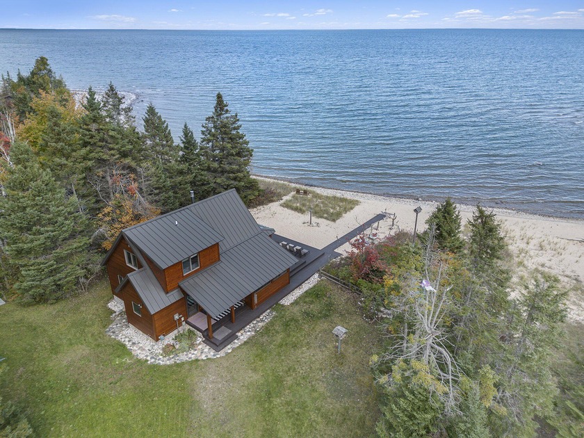 Forget fleeting getaways-this is your year-round private - Beach Home for sale in Ocqueoc, Michigan on Beachhouse.com