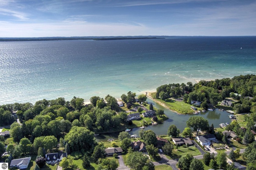 ESTATE SALE - walk out your back door, hop in your boat and - Beach Home for sale in Elk Rapids, Michigan on Beachhouse.com