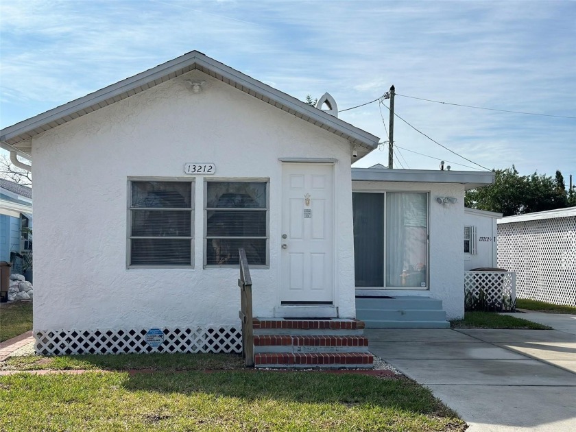 Just steps from the beach, this duplex property offers a rare - Beach Lot for sale in Madeira Beach, Florida on Beachhouse.com