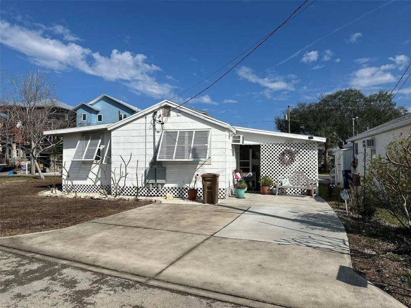 Just steps from the beach, this duplex property offers a rare - Beach Lot for sale in Madeira Beach, Florida on Beachhouse.com