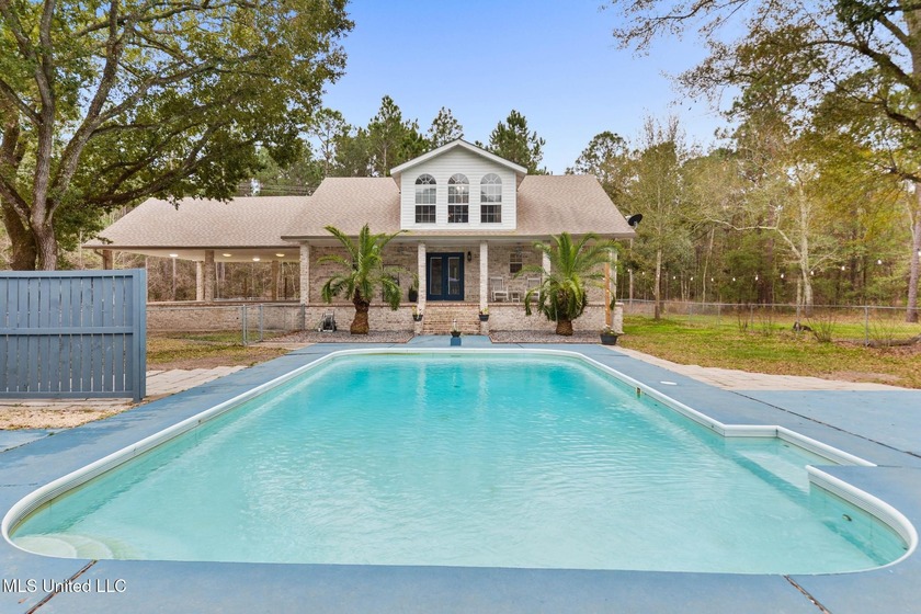Enjoy privacy, space, and convenience in this 4-bedroom, 2 - Beach Home for sale in Bay Saint Louis, Mississippi on Beachhouse.com