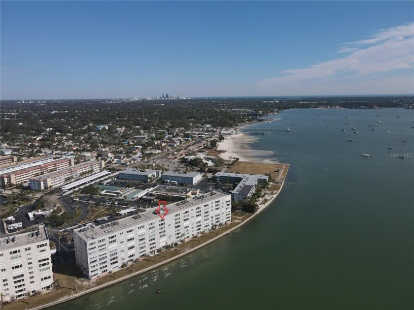 Indulge in breathtaking views of Boca Ciega Bay and the iconic - Beach Condo for sale in Gulfport, Florida on Beachhouse.com