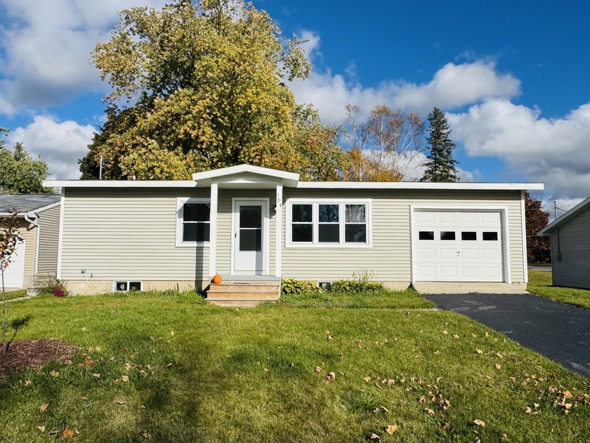 This delightful 2-bedroom, 1-bath home sits just steps from the - Beach Home for sale in Alpena, Michigan on Beachhouse.com