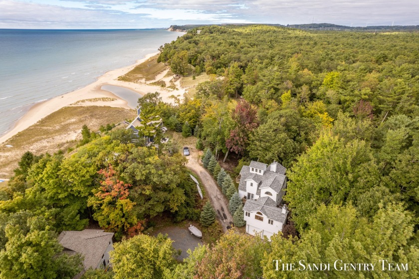 Your Private Lakeshore Escape Awaits: Nestled among the trees - Beach Home for sale in Pentwater, Michigan on Beachhouse.com