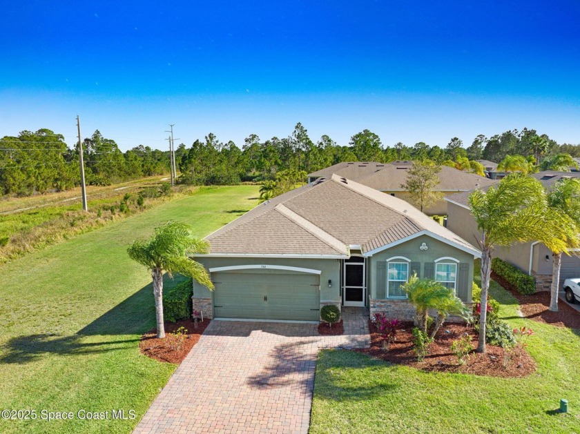 COME & SEE this MOVE-IN READY 4-bedroom, 2-bathroom home in a - Beach Home for sale in Palm Bay, Florida on Beachhouse.com