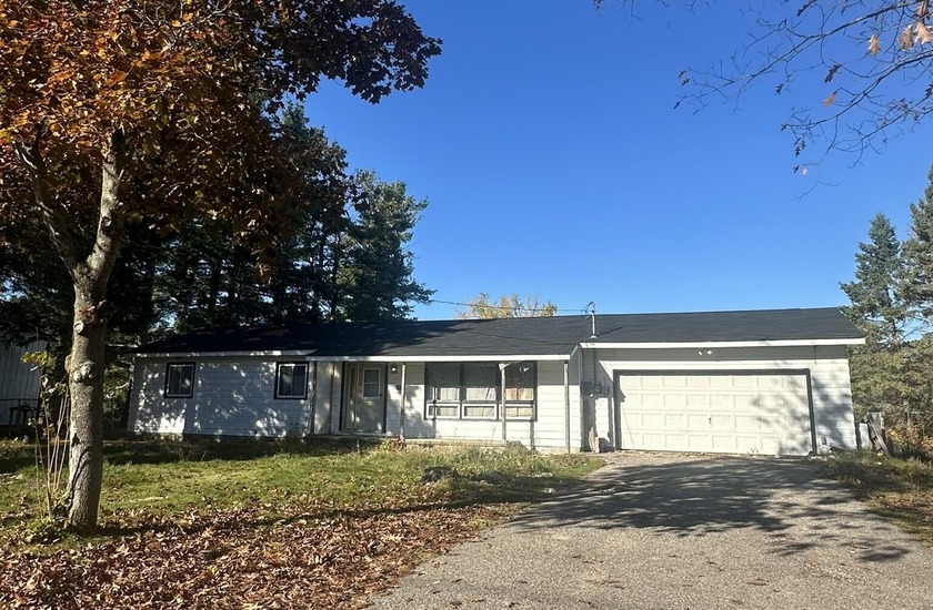 New roof and back deck on this cozy 3 bedroom 1.5 baths home - Beach Home for sale in Cheboygan, Michigan on Beachhouse.com