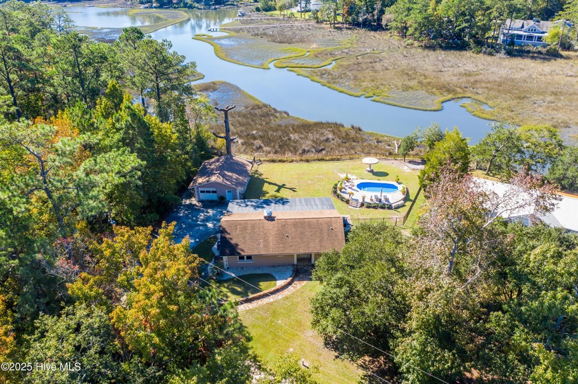 Welcome to this rare coastal retreat tucked at the end of a - Beach Home for sale in Hampstead, North Carolina on Beachhouse.com