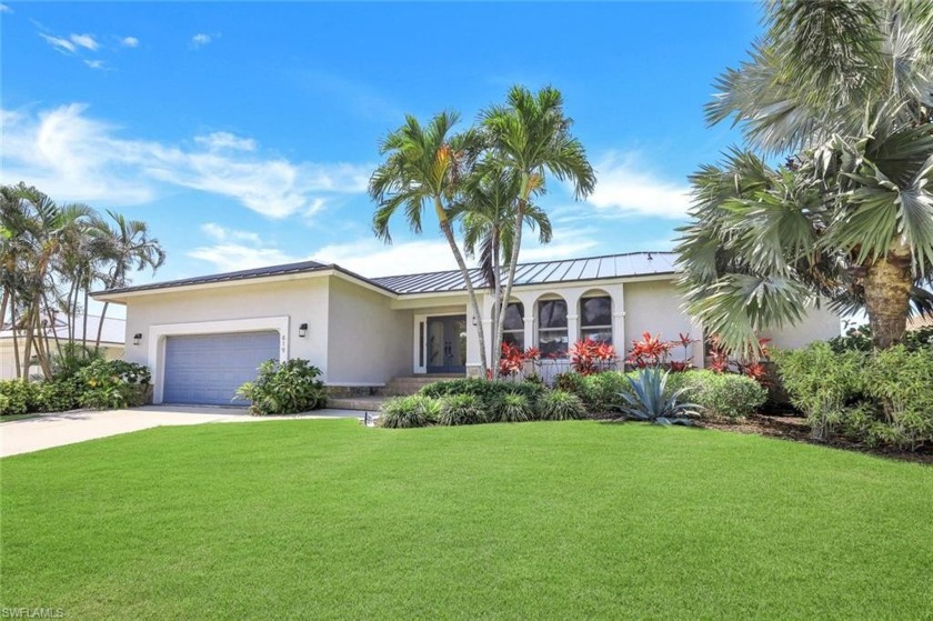 CLASSIC ISLAND GEM! Ideally located in the heart of Olde Marco - Beach Home for sale in Marco Island, Florida on Beachhouse.com