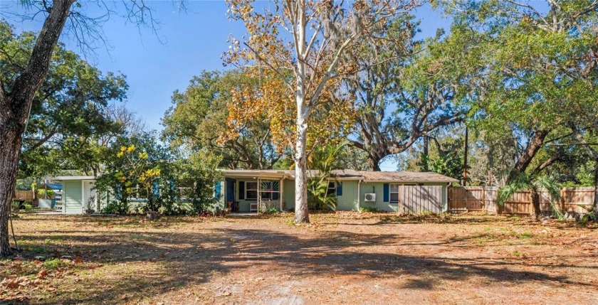 Nestled on .55 acres with tons of open space for large family - Beach Home for sale in New Port Richey, Florida on Beachhouse.com