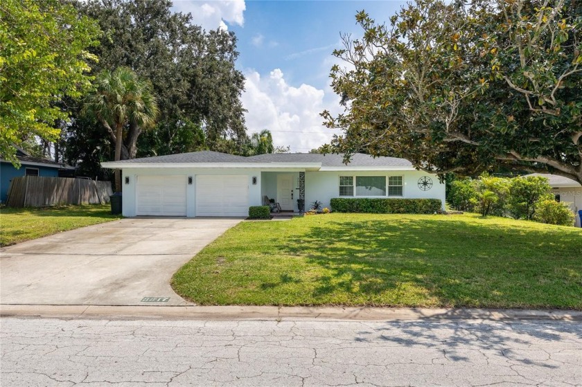 Experience the charm and modern comforts of this beautifully - Beach Home for sale in Dunedin, Florida on Beachhouse.com