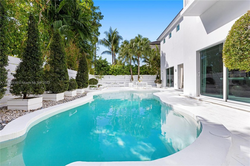 ENJOY THE PEACEFUL AESTHETIC OF THIS TREE-LINED KEY BISCAYNE - Beach Home for sale in Key  Biscayne, Florida on Beachhouse.com