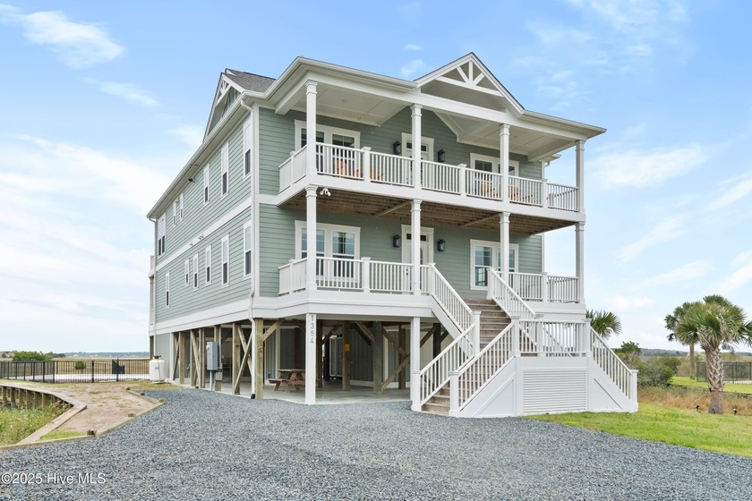 Built in 2024 and situated on a rare second-row lot spanning - Beach Home for sale in Holden Beach, North Carolina on Beachhouse.com