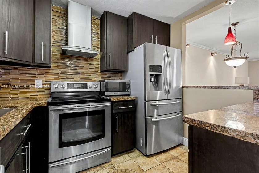 If you're tired of gray walls and white kitchens, then this is - Beach Condo for sale in Margate, Florida on Beachhouse.com