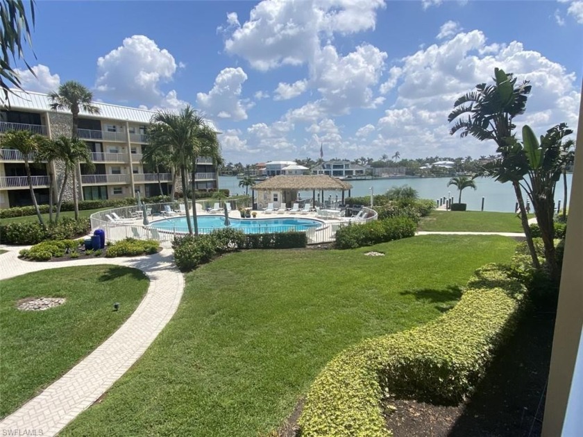 Move right into this turnkey, beautifully furnished 2 bedroom, 2 - Beach Condo for sale in Naples, Florida on Beachhouse.com