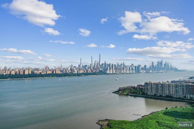 Discover luxurious waterfront living with this stunning 2.5 - Beach Condo for sale in Edgewater, New Jersey on Beachhouse.com