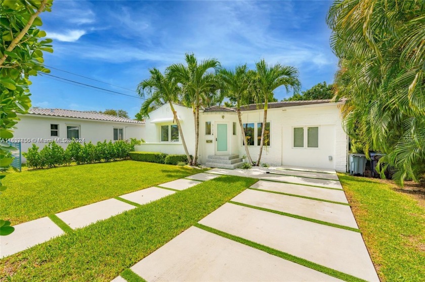 Discover a tranquil retreat in the heart of Miami Beach, in - Beach Home for sale in Miami Beach, Florida on Beachhouse.com