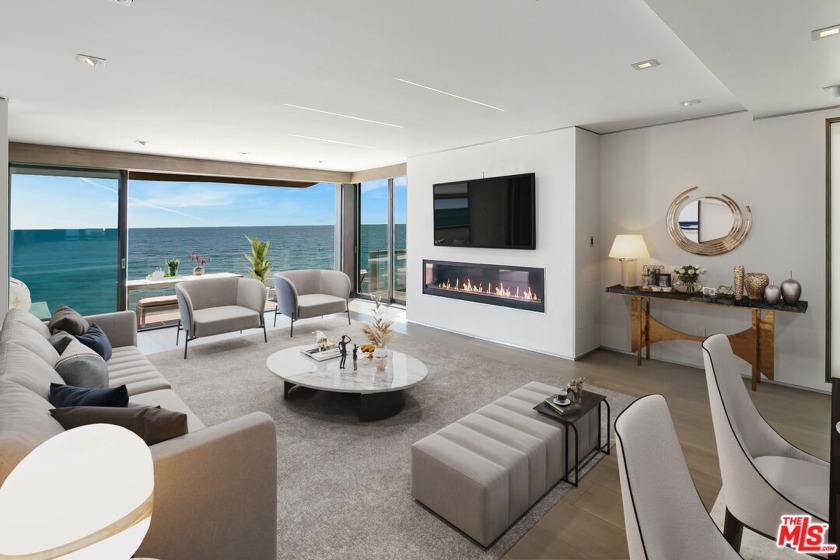 Designer-done oceanfront home nestled on an iconic stretch of - Beach Home for sale in Malibu, California on Beachhouse.com