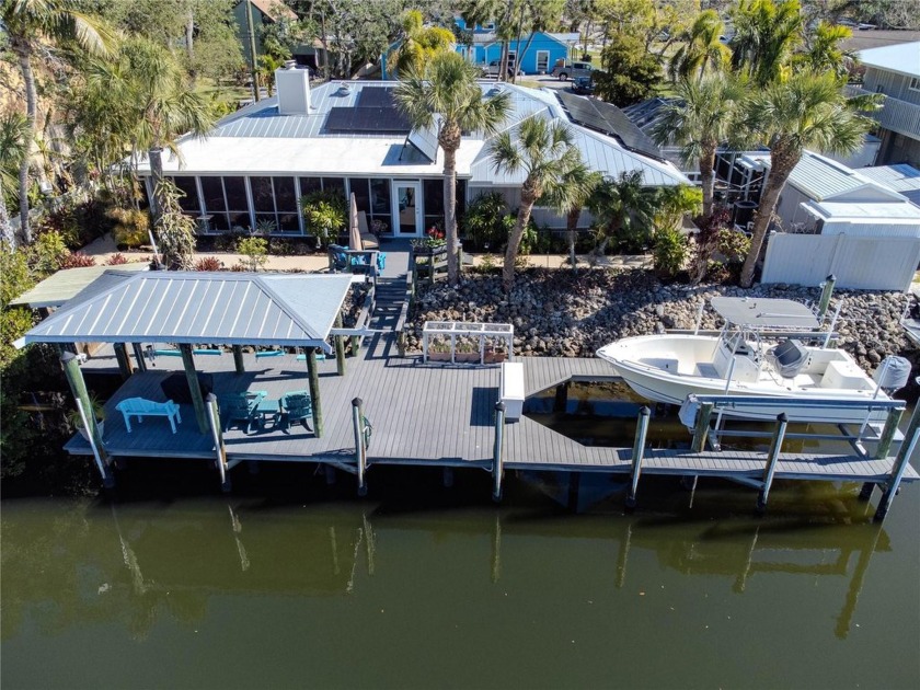 Welcome to 903 20th Ave W, a rare waterfront retreat where - Beach Home for sale in Palmetto, Florida on Beachhouse.com