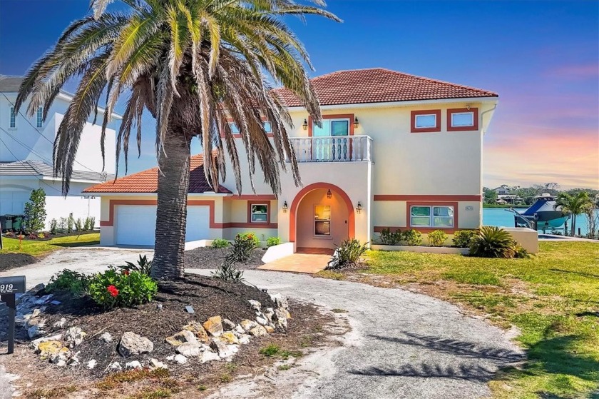 Tucked away at the end of a private cul-de-sac, this stunning - Beach Home for sale in Nokomis, Florida on Beachhouse.com