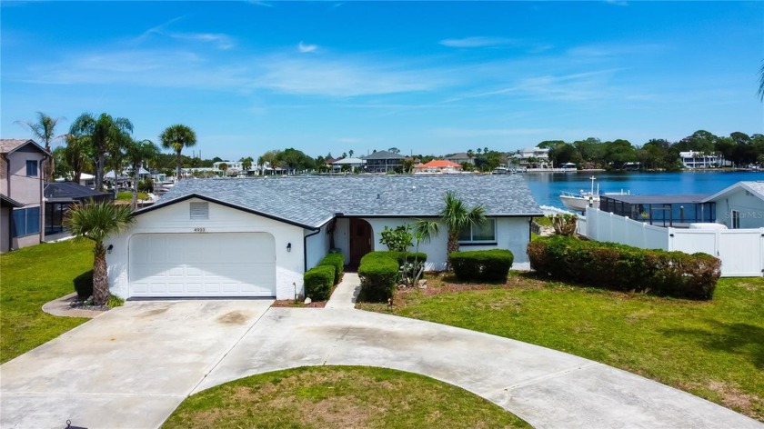 WOW! LOCATION, LOCATION, LOCATION! This home has 94 FEET OF - Beach Home for sale in Port Richey, Florida on Beachhouse.com