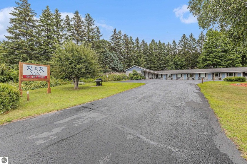 Discover a rare chance to own a family-run motel and home just - Beach Commercial for sale in Frankfort, Michigan on Beachhouse.com