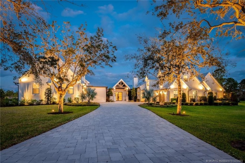 Impeccably renovated to perfection, this six thousand plus sq ft - Beach Home for sale in Palm City, Florida on Beachhouse.com