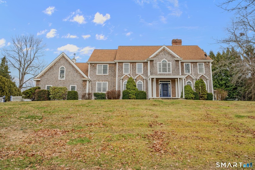 Discover this sun-drenched 4-bedroom Colonial nestled in the - Beach Home for sale in Waterford, Connecticut on Beachhouse.com