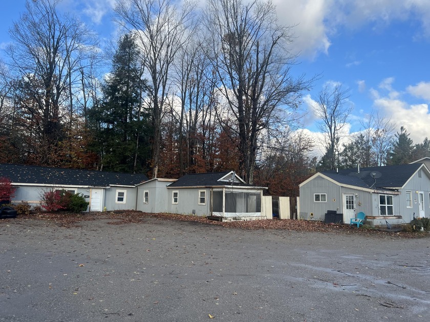 Income-producing property featuring three buildings - a - Beach Home for sale in Alanson, Michigan on Beachhouse.com