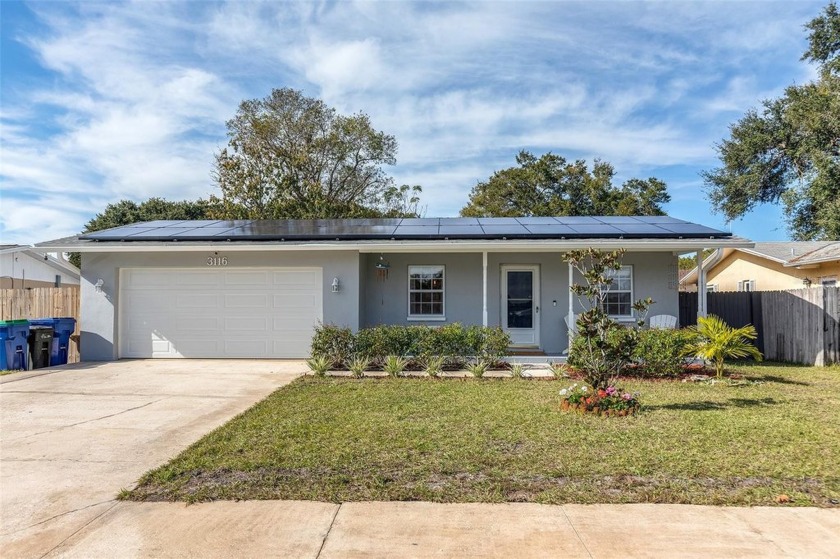 Nestled in the heart of Dunedin, this 4-bedroom, 2-bathroom home - Beach Home for sale in Dunedin, Florida on Beachhouse.com