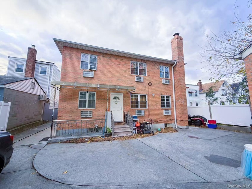 A super-sized, detached two-family home in College Point on a - Beach Home for sale in Flushing, New York on Beachhouse.com