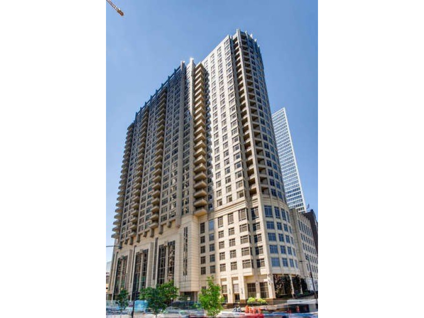 This bright corner unit has stunning Lake views from large - Beach Condo for sale in Chicago, Illinois on Beachhouse.com