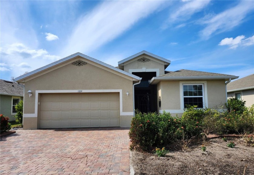 Discover your dream home at 5229 Canyonland Way, nestled in the - Beach Home for sale in Venice, Florida on Beachhouse.com