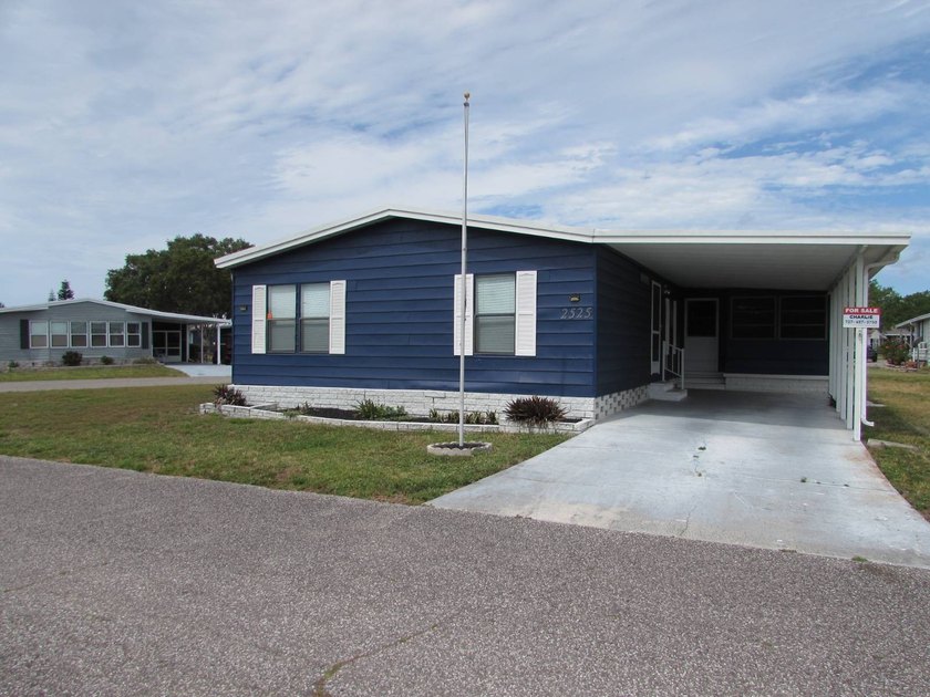 This 3 bed 2 bath palm harbor is a fixer upper on a large corner - Beach Home for sale in Trinity, Florida on Beachhouse.com