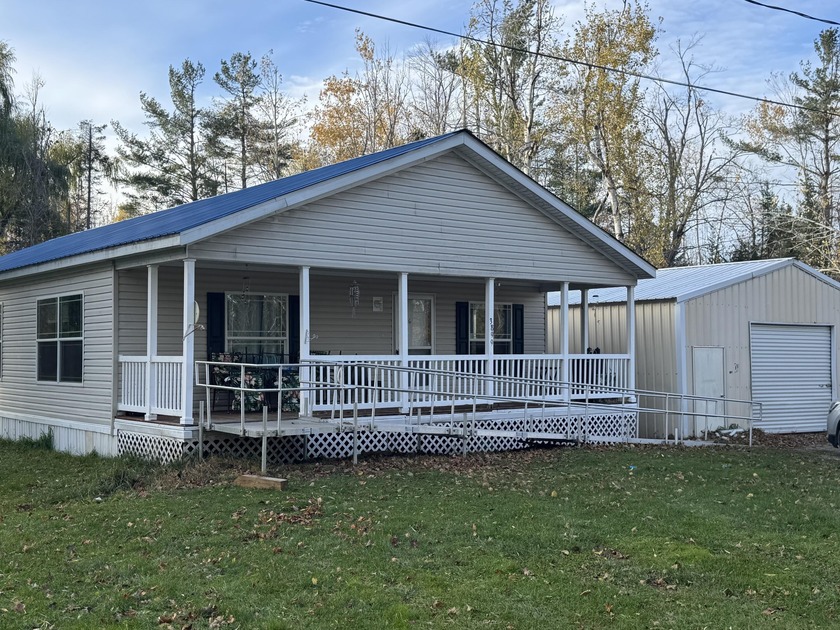 Discover the perfect Northern Michigan retreat at 3899 Miami - Beach Home for sale in Cheboygan, Michigan on Beachhouse.com