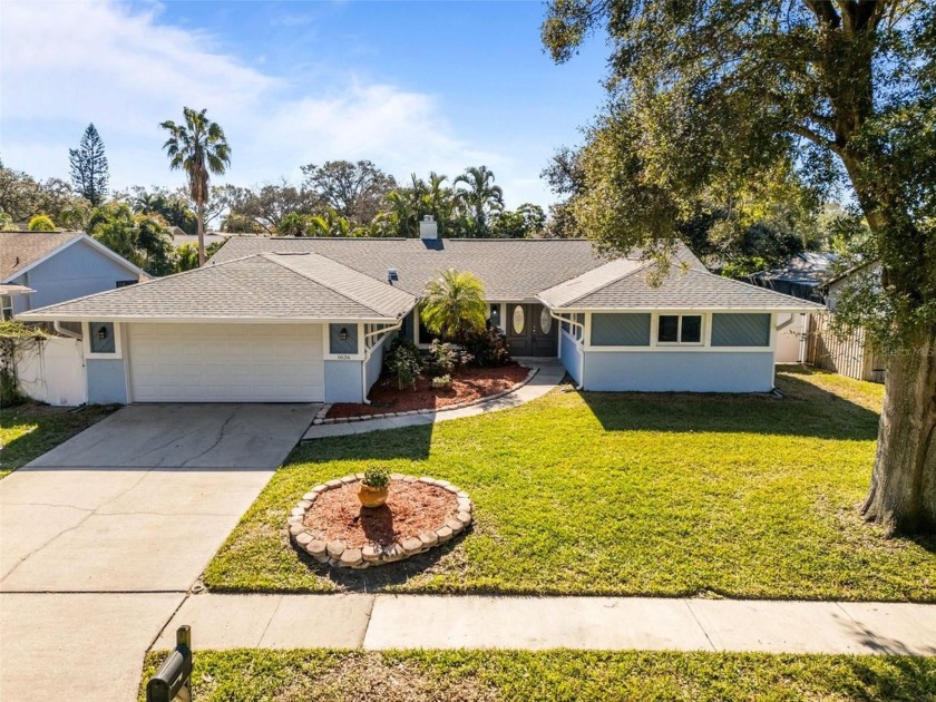 Welcome to this incredible 4-bedroom, 2-bath pool home, perfect - Beach Home for sale in Palm Harbor, Florida on Beachhouse.com