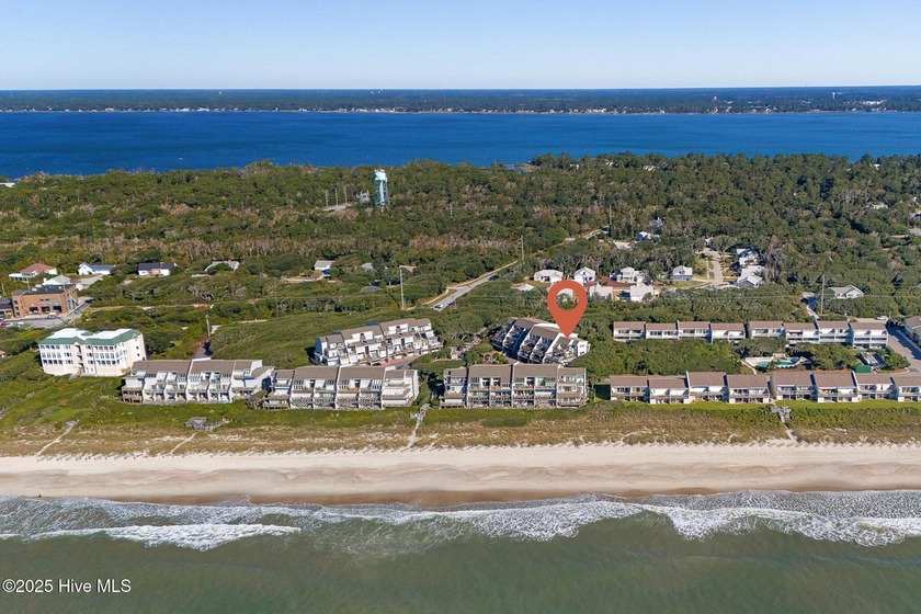 Embrace the coastal lifestyle you've been dreaming of at Genesis - Beach Condo for sale in Pine Knoll Shores, North Carolina on Beachhouse.com