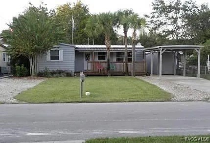 Canal frontage 2 bedroom 2 bath modular with front porch - Beach Home for sale in Homosassa, Florida on Beachhouse.com