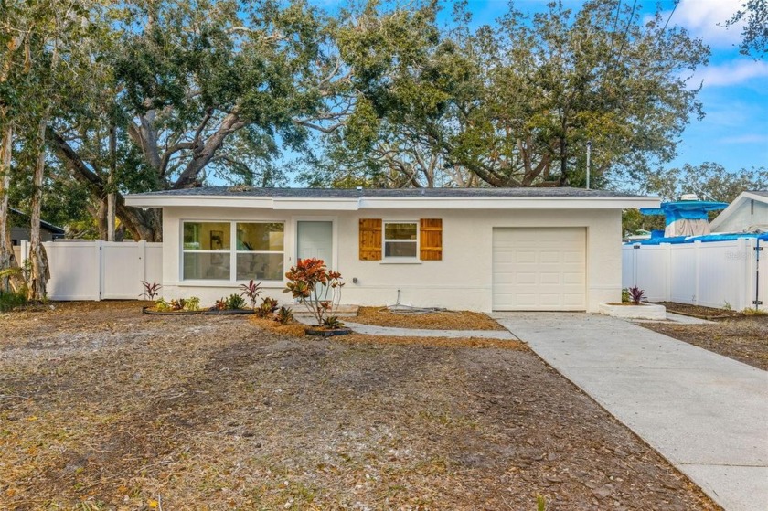 Located in the desirable Golf Cart District of Dunedin, this - Beach Home for sale in Dunedin, Florida on Beachhouse.com