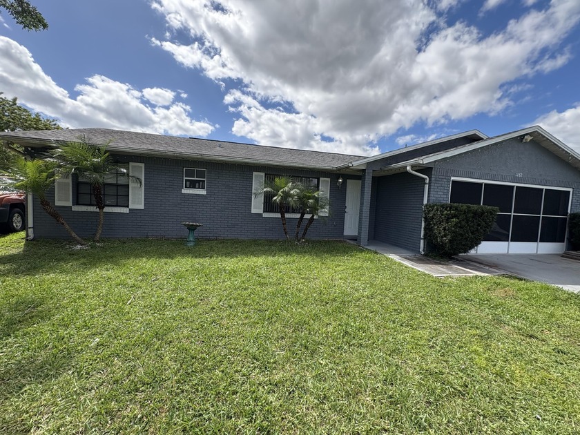 Welcome to this charming 3-bedroom, 2-bath ranch-style home in - Beach Home for sale in Palm Bay, Florida on Beachhouse.com