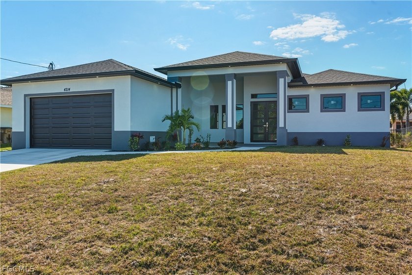 This beautiful new construction custom home. The house offers - Beach Home for sale in Cape Coral, Florida on Beachhouse.com