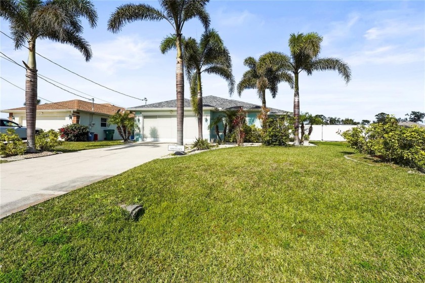 Welcome to this charming pool home on a spacious corner double - Beach Home for sale in Rotonda West, Florida on Beachhouse.com
