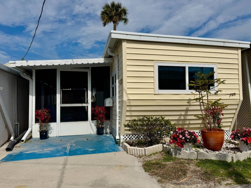 Nestled in the serene Sandpiper Resort Co-op, this charming 1965 - Beach Home for sale in Bradenton Beach, Florida on Beachhouse.com