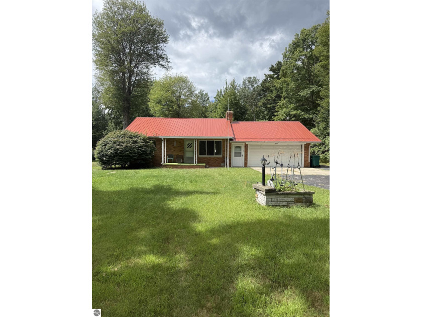 This solid 2-bedroom, 1-bath brick home offers endless potential - Beach Home for sale in Tawas City, Michigan on Beachhouse.com