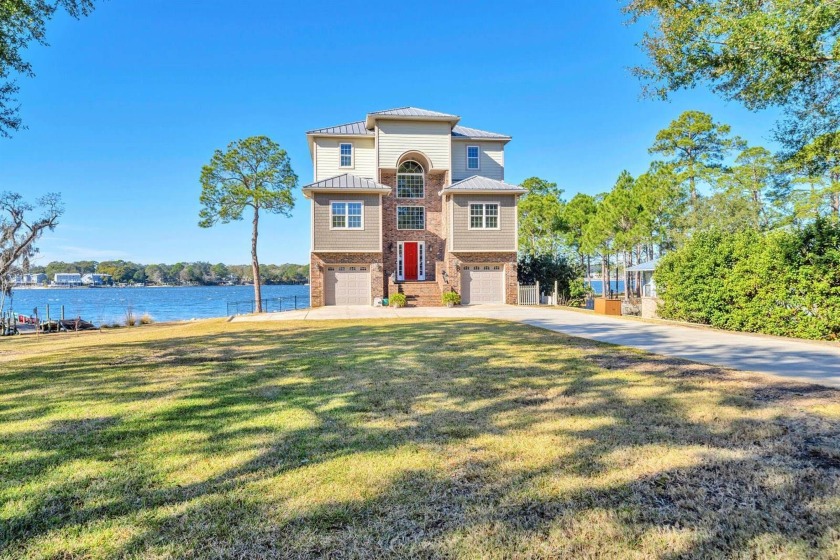Enjoy peaceful mornings and endless sunsets from absolutely - Beach Home for sale in Niceville, Florida on Beachhouse.com