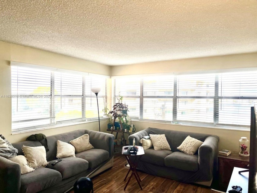 Great corner unit full of natural light. Spacious interior with - Beach Condo for sale in Hallandale Beach, Florida on Beachhouse.com