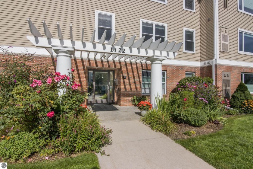 Lake Views & Shared Frontage in downtown Traverse City! This - Beach Condo for sale in Traverse City, Michigan on Beachhouse.com