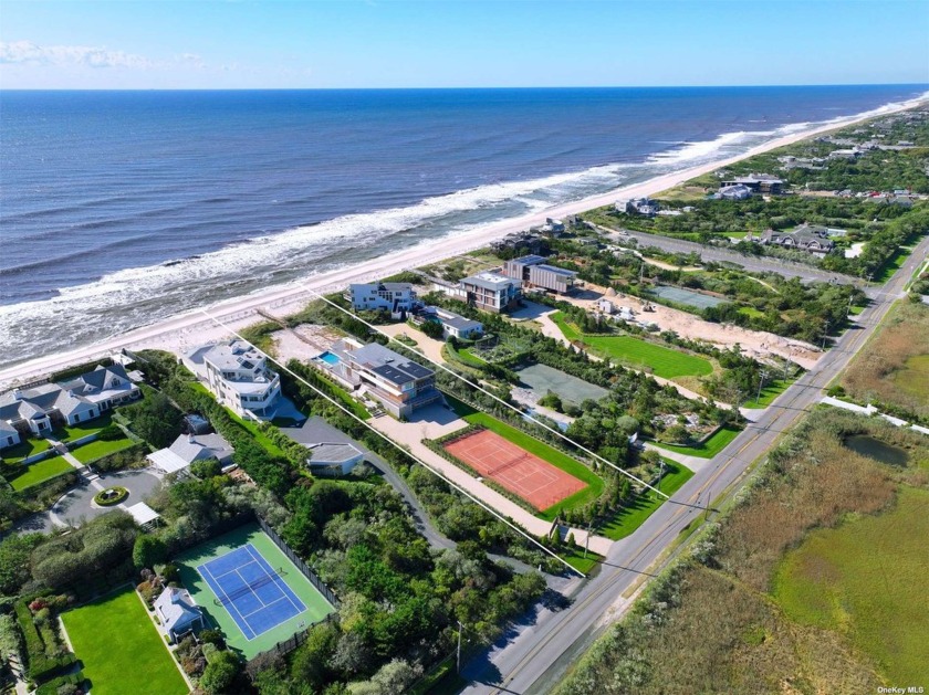 Perched majestically and soaring high above the white sandy - Beach Home for sale in Quogue, New York on Beachhouse.com