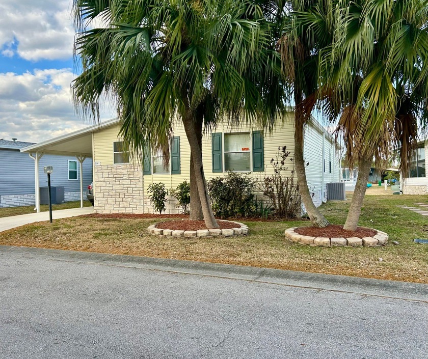 Stunning lakefront home offering expansive water views and - Beach Home for sale in Melbourne, Florida on Beachhouse.com