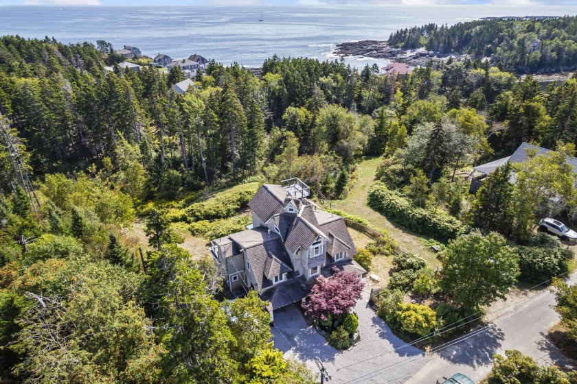 Perched high atop Summer Hill, this unique home offers sweeping - Beach Home for sale in Harpswell, Maine on Beachhouse.com